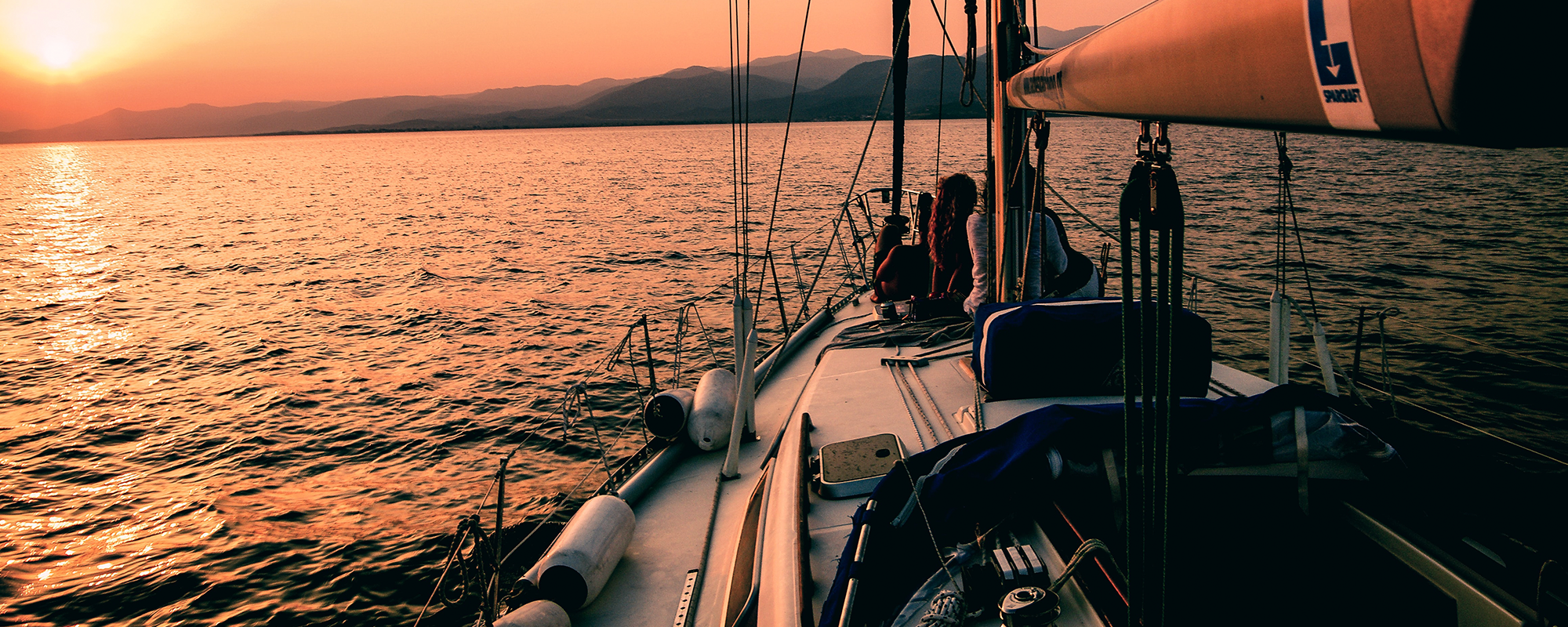 Sailboat Sailing in Sunset